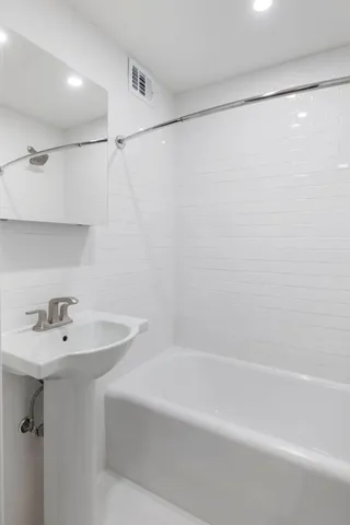 a kitchen with a stove and a microwave