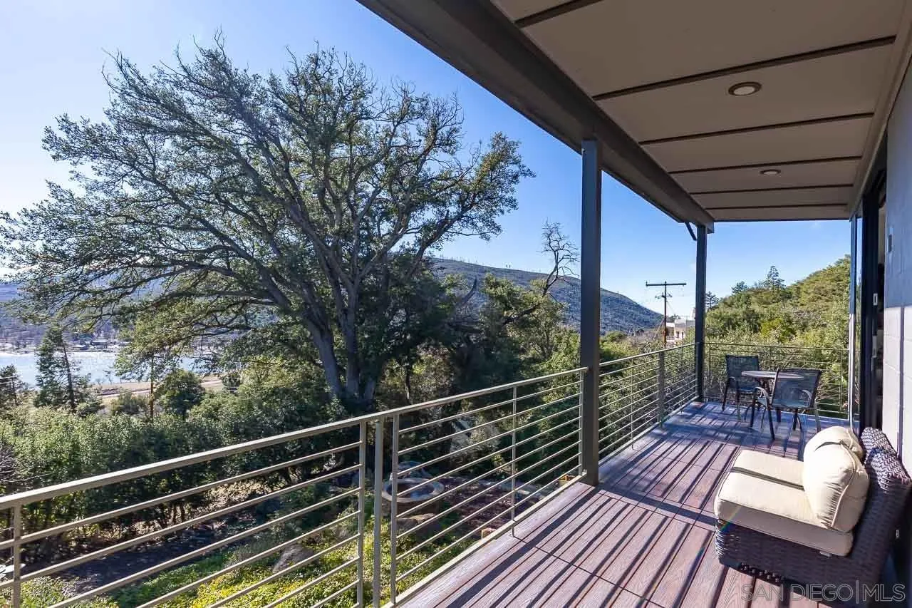 34747 Yuma Road Julian, CA 92036 - Photo 8 of 26 a view of balcony with wooden floor and outdoor seating