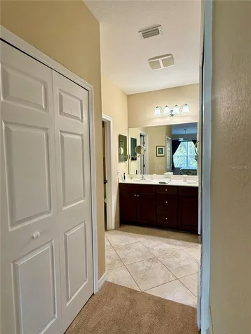 a view of a garden with a bench in a garden