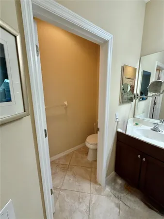 a bathroom with a double vanity sink mirror and shower