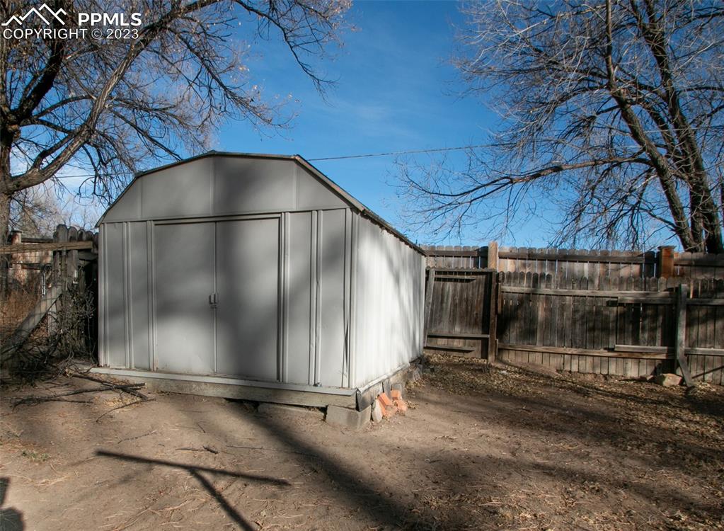 915 Alexander Road Colorado Springs, CO 80909 - Photo 23 of 24 a area with wooden fence