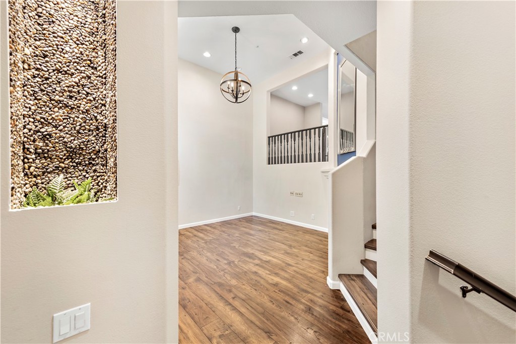 158 North Brea Boulevard Brea, CA 92821 - Photo 5 of 20 a view of a hallway with a white walls