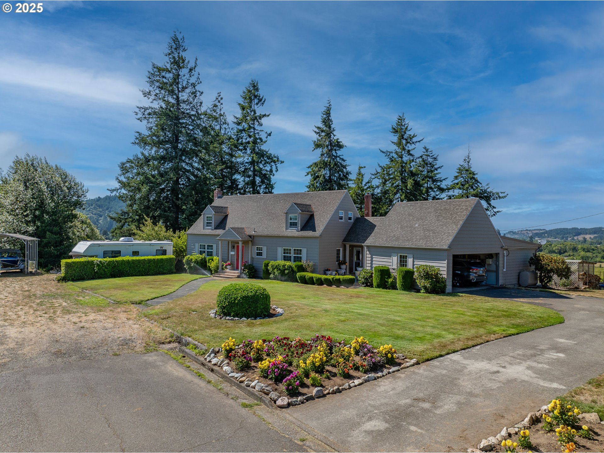 1211 Fairview Street Myrtle Point, OR 97458 - Photo 1 of 48 a front view of a house with garden