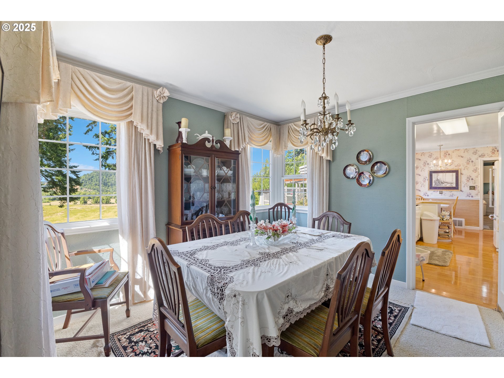 1211 Fairview Street Myrtle Point, OR 97458 - Photo 14 of 48 a view of a dining room with furniture and chandelier