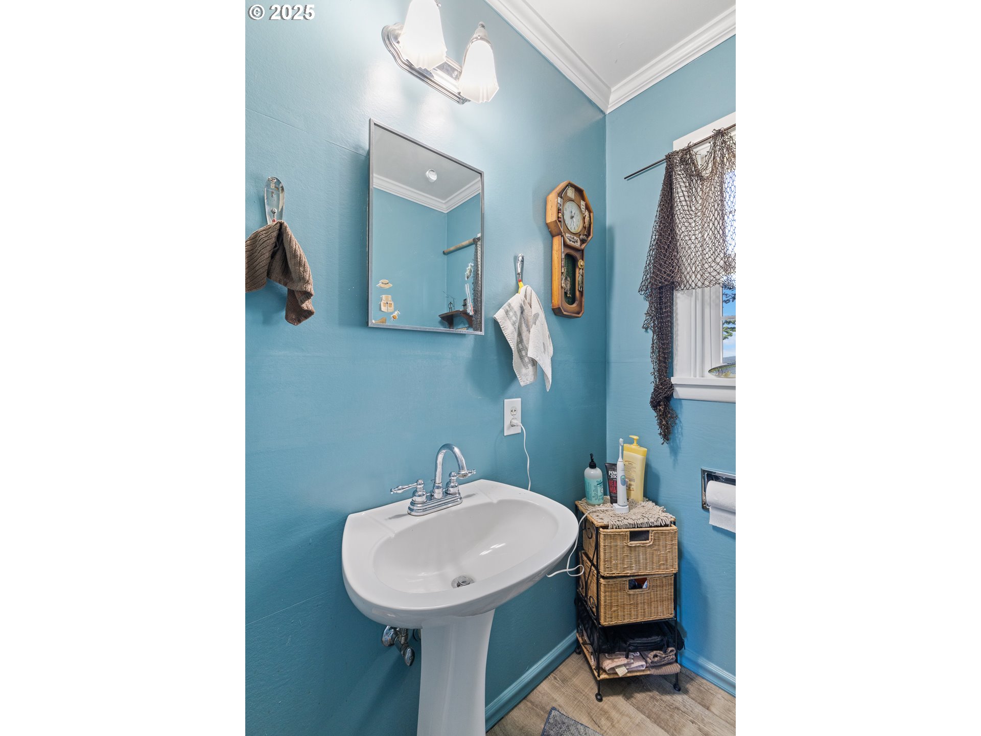 1211 Fairview Street Myrtle Point, OR 97458 - Photo 22 of 48 a bathroom with a sink and mirror