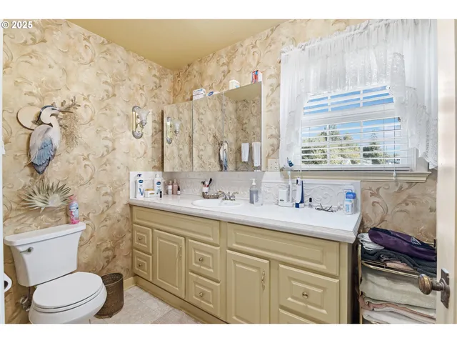 a view of a hallway with seating area