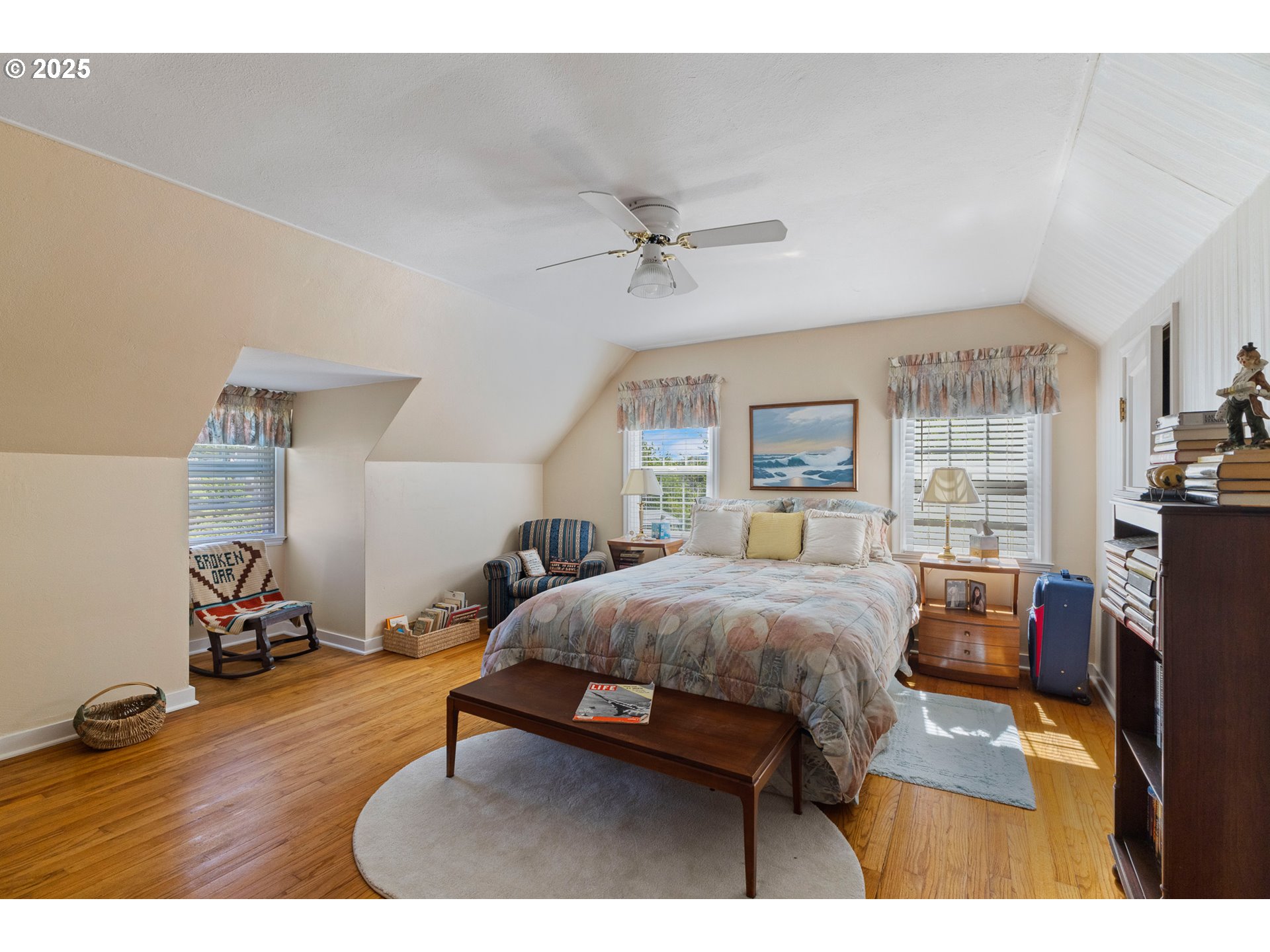 1211 Fairview Street Myrtle Point, OR 97458 - Photo 32 of 48 a bedroom with a bed and wooden floor