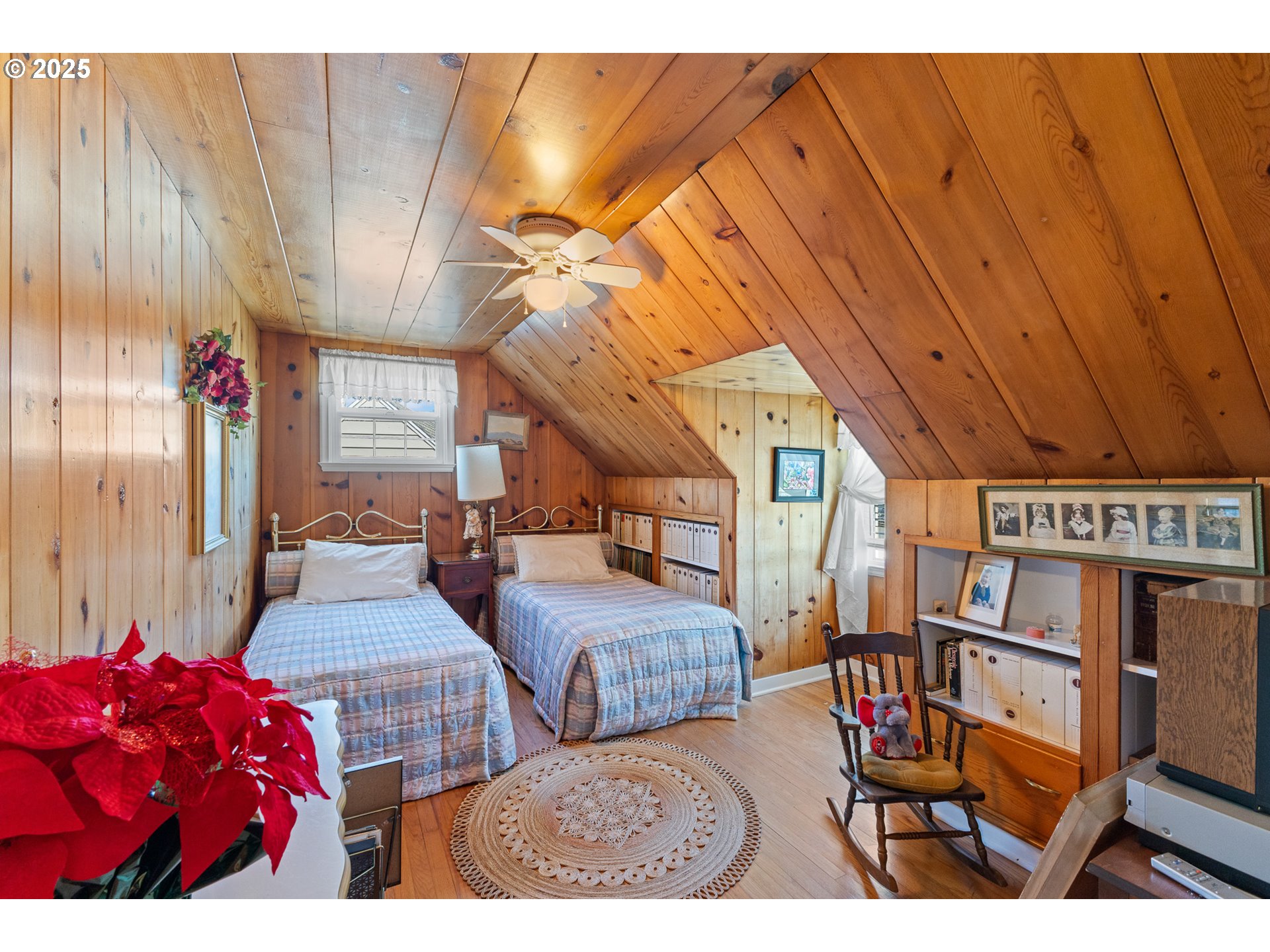 1211 Fairview Street Myrtle Point, OR 97458 - Photo 36 of 48 a bedroom with furniture and a book shelf