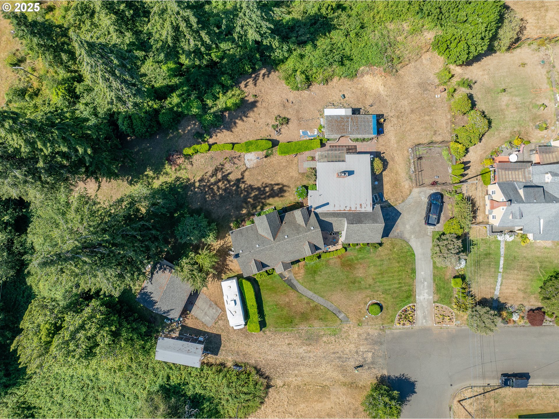 1211 Fairview Street Myrtle Point, OR 97458 - Photo 8 of 48 an aerial view of residential houses with outdoor space and parking