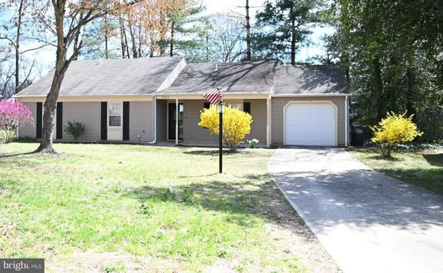 a kitchen with stainless steel appliances a refrigerator stove and sink