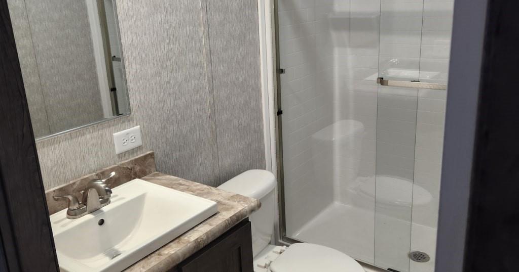 1302 Hidden Valley Road Bulger, PA 15019 - Photo 4 of 19 a bathroom with a sink toilet and shower