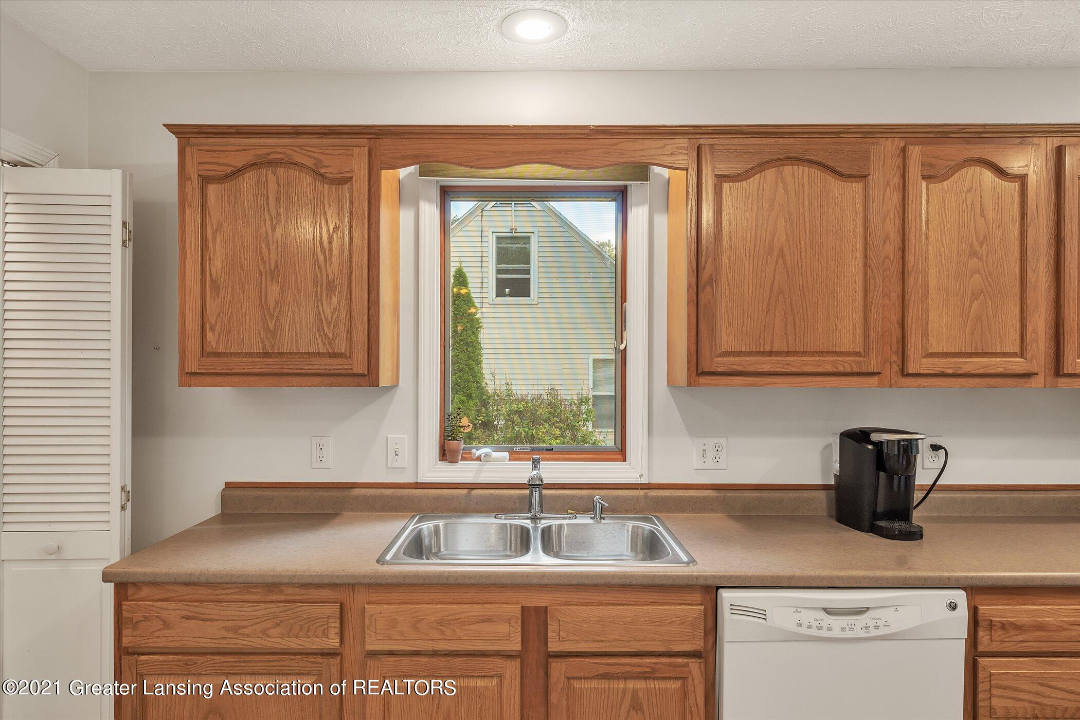4603 Old Lansing Road Lansing, MI 48917 - Photo 9 of 34 14-4603-Old-Lansing-Rd-Windowstill-Real-