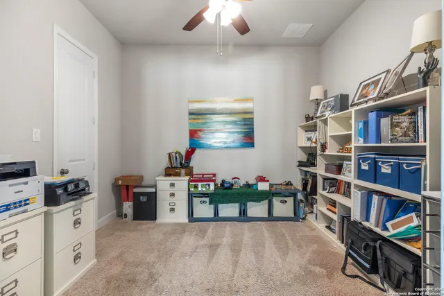 a kitchen with a stove and a refrigerator