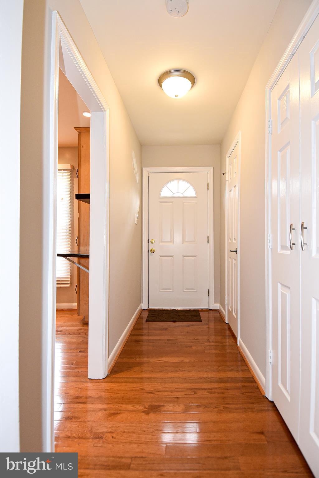 2412 Alsop Court Reston, VA 20191 - Photo 3 of 44 Large coat closet and half bath in the foyer