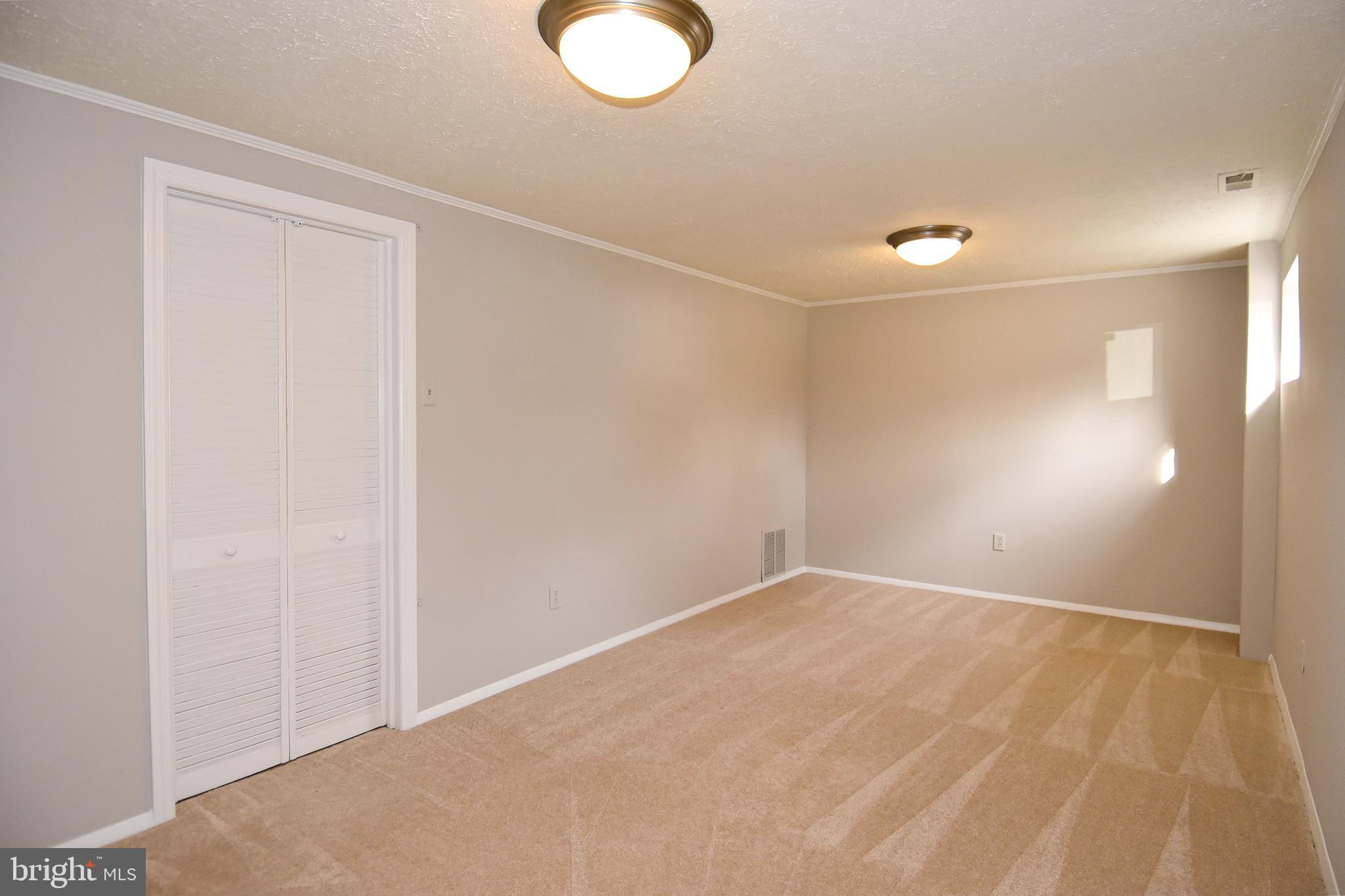 2412 Alsop Court Reston, VA 20191 - Photo 32 of 44 Finished basement rec room