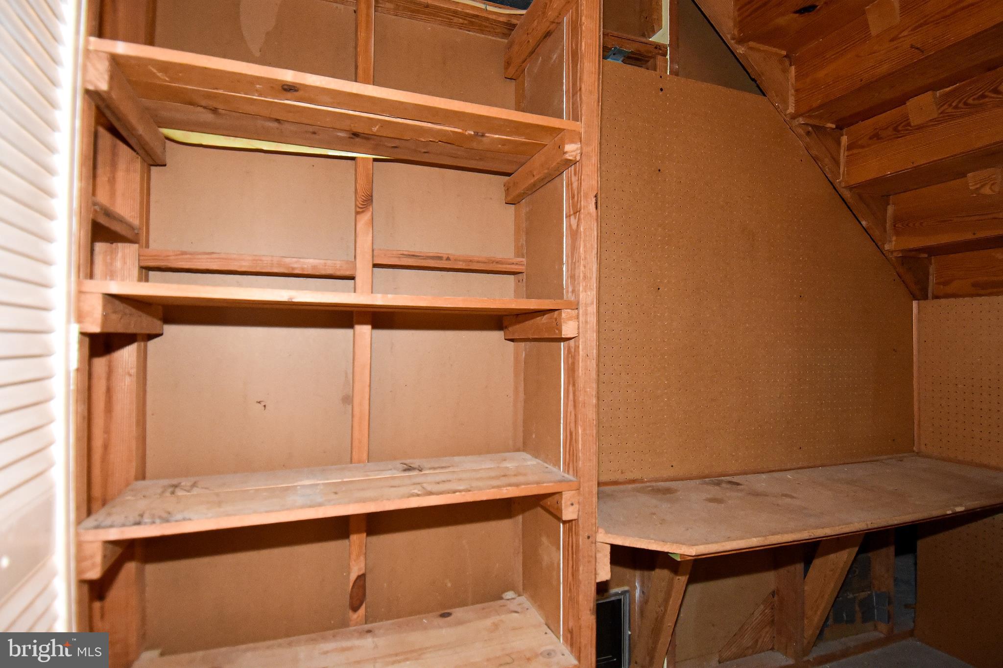 2412 Alsop Court Reston, VA 20191 - Photo 37 of 44 Work bench area, additional storage in crawl space