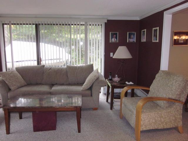 110 Guildford Road Centerville, MA 02632 - Photo 13 of 25 a living room with furniture and a large window