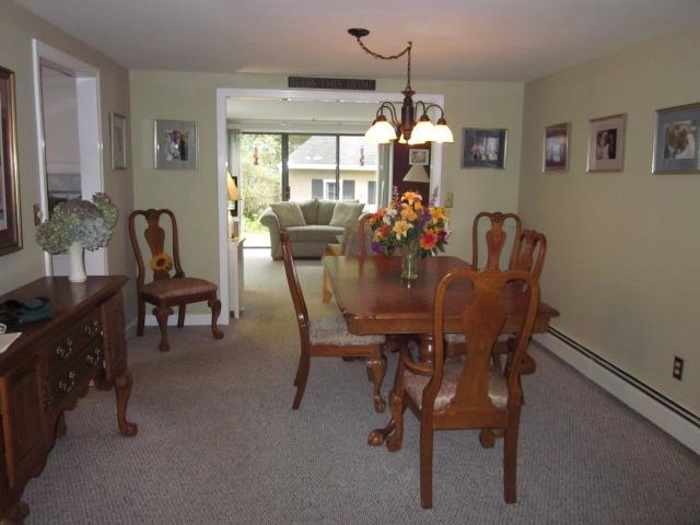 110 Guildford Road Centerville, MA 02632 - Photo 9 of 25 a view of a dining room with furniture window and outside view
