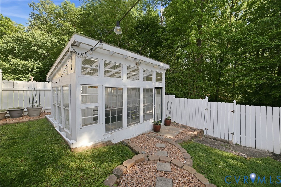 9509 Meadowview Road Henrico, VA 23294 - Photo 2 of 38 a view of a house with a yard and large tree