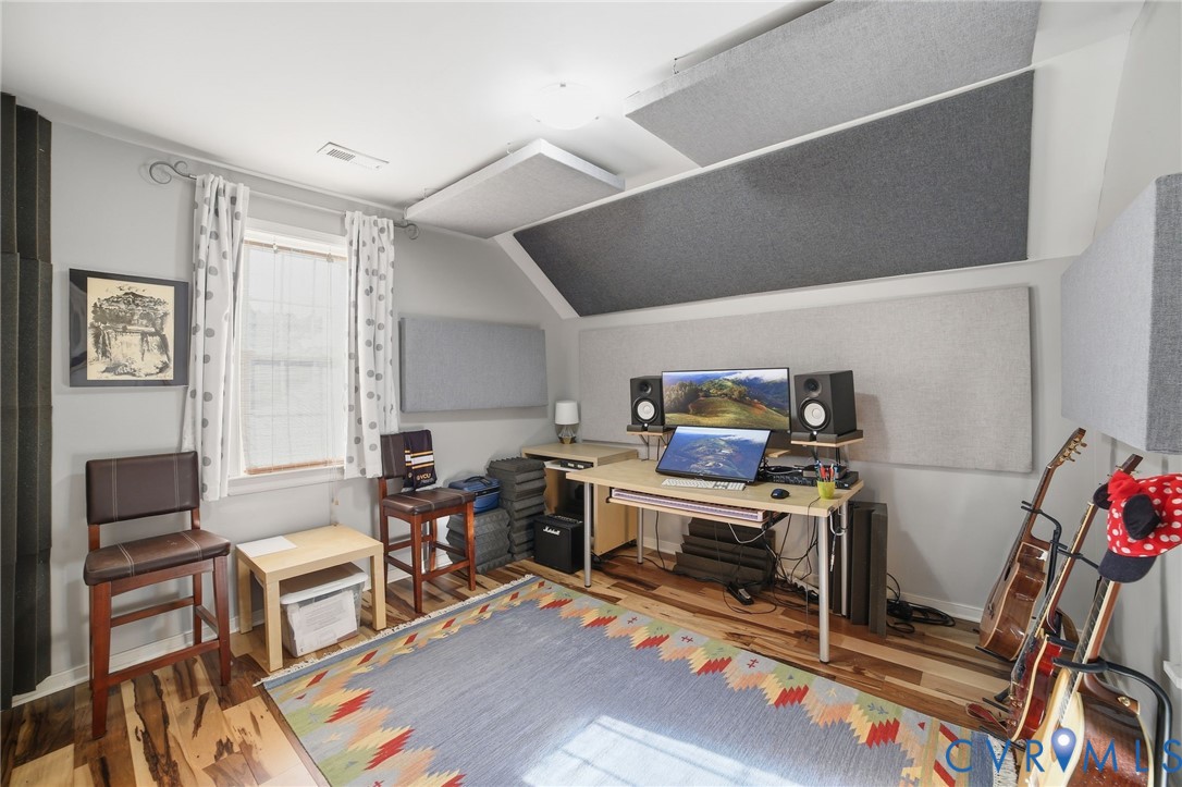 9509 Meadowview Road Henrico, VA 23294 - Photo 23 of 38 a workspace with furniture and wooden floor
