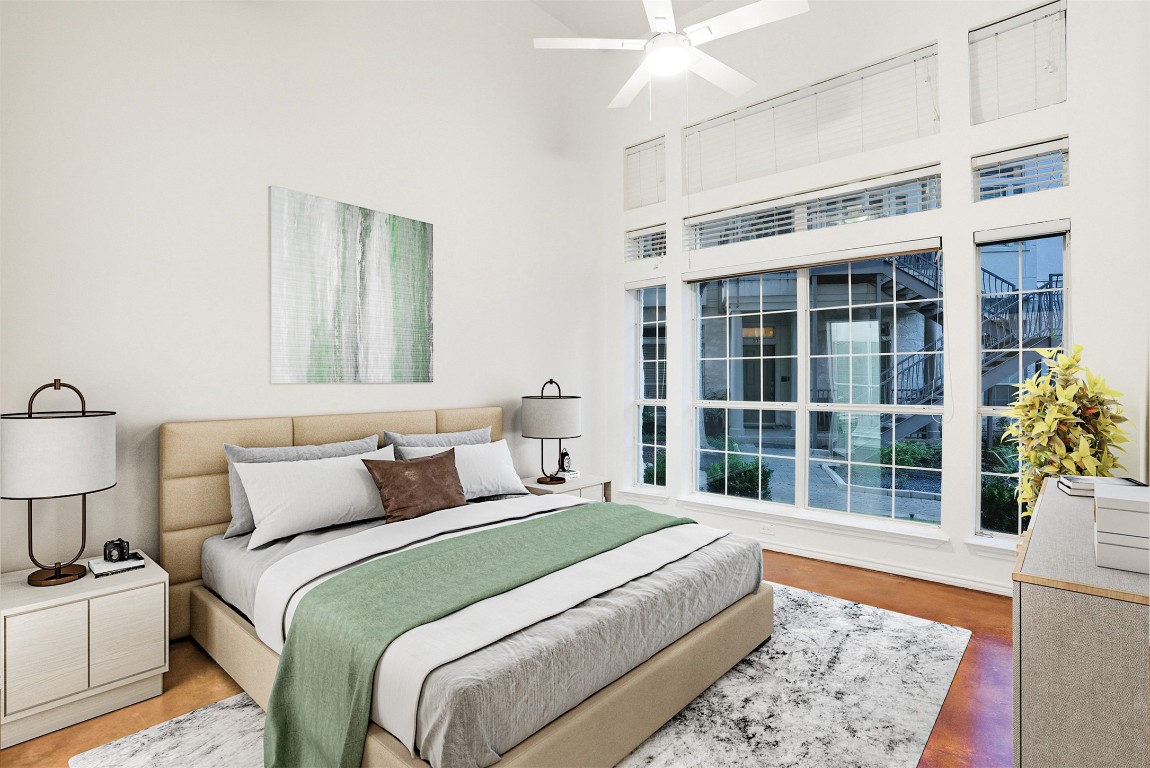 2918 Ranch To Market Road 620, Unit V267 Austin, TX 78734 - Photo 20 of 40 . Spacious primary suite at the back for added privacy boasting tall ceilings and a jetted garden tub and shower.