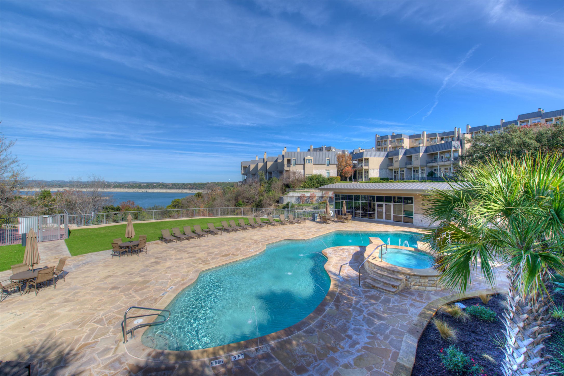 2918 Ranch To Market Road 620, Unit V267 Austin, TX 78734 - Photo 28 of 40 a view of a swimming pool with a yard