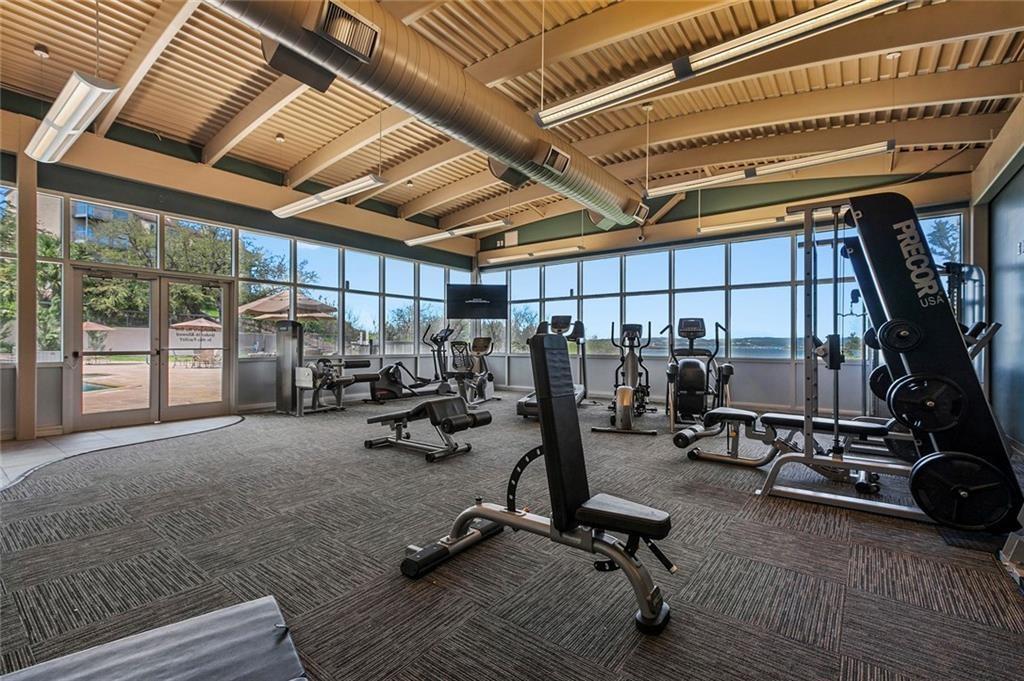 2918 Ranch To Market Road 620, Unit V267 Austin, TX 78734 - Photo 29 of 40 Welcome to waterfront condo living in the gated community of The Villas on Lake Travis. This property offers an active lifestyle filled with amazing amenities including 2 pools and spas, gym, tennis, basketball, private garden, dog area, reserved covered parking for owners and their guests plus a tram to the private, covered boat dock with party deck on the lake.