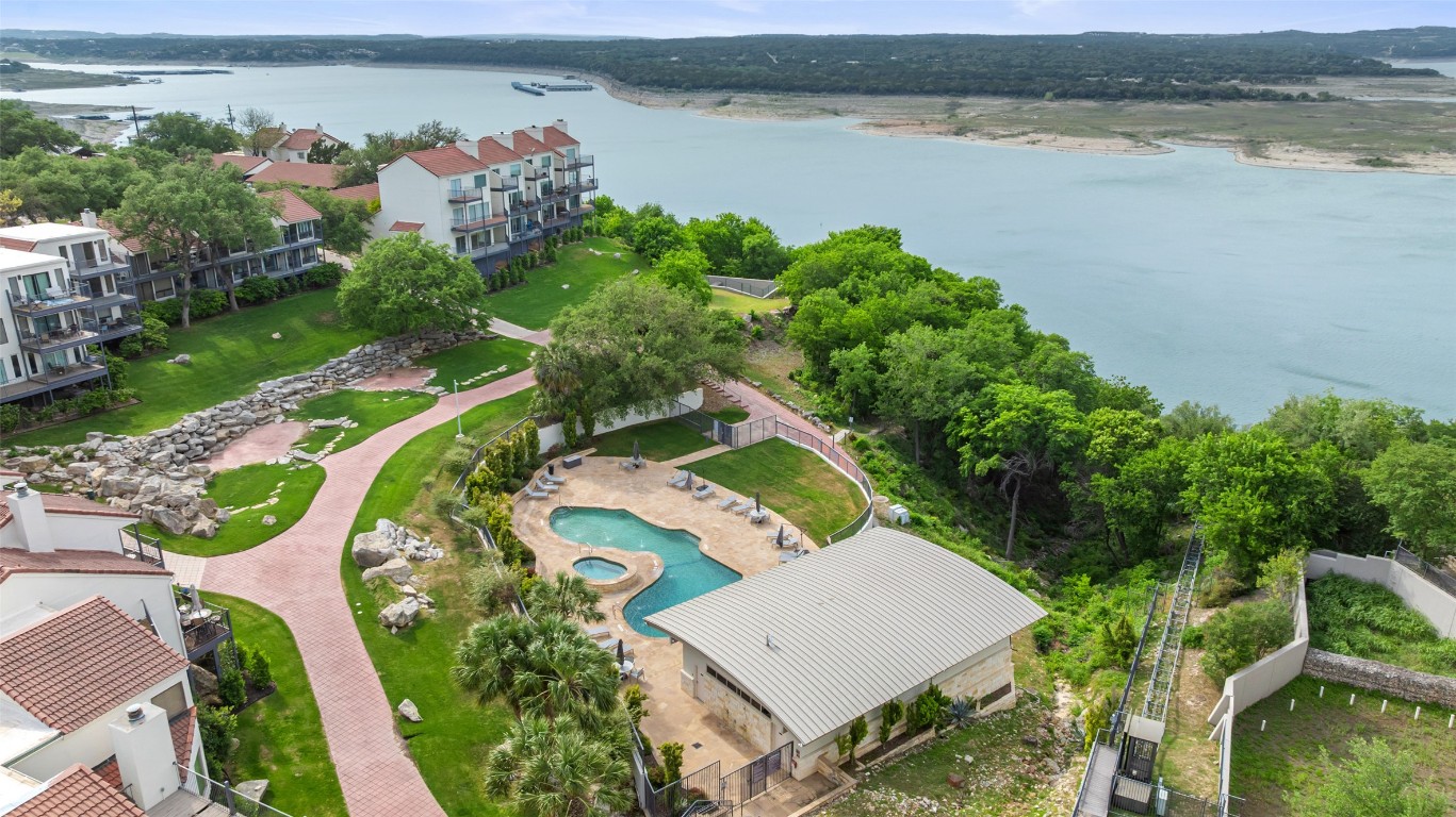 2918 Ranch To Market Road 620, Unit V267 Austin, TX 78734 - Photo 30 of 40 Welcome to waterfront condo living in the gated community of The Villas on Lake Travis. This property offers an active lifestyle filled with amazing amenities including 2 pools and spas, gym, tennis, basketball, private garden, dog area, reserved covered parking for owners and their guests plus a tram to the private, covered boat dock with party deck on the lake.