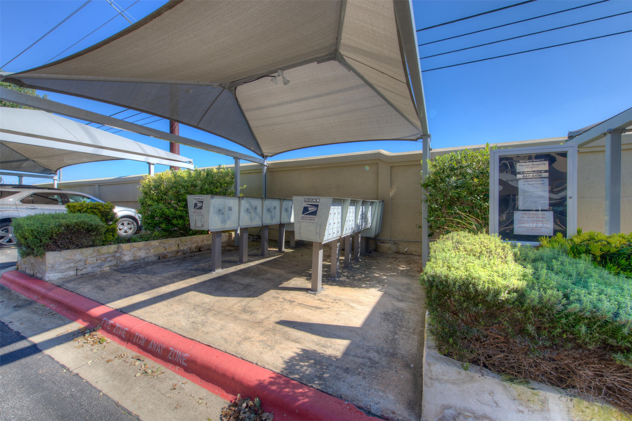 2918 Ranch To Market Road 620, Unit V267 Austin, TX 78734 - Photo 3 of 40 a patio with a table and chairs under an umbrella