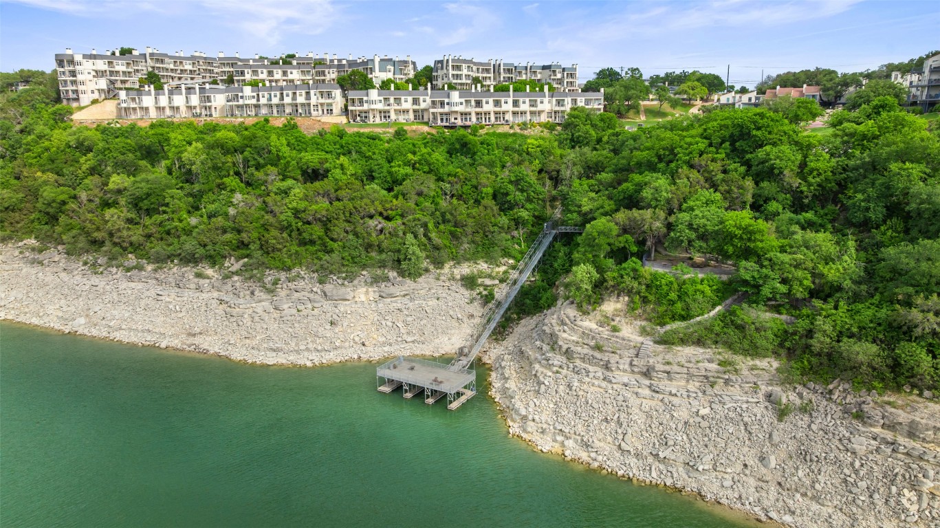 2918 Ranch To Market Road 620, Unit V267 Austin, TX 78734 - Photo 37 of 40 Welcome to waterfront condo living in the gated community of The Villas on Lake Travis. This property offers an active lifestyle filled with amazing amenities including 2 pools and spas, gym, tennis, basketball, private garden, dog area, reserved covered parking for owners and their guests plus a tram to the private, covered boat dock with party deck on the lake.
