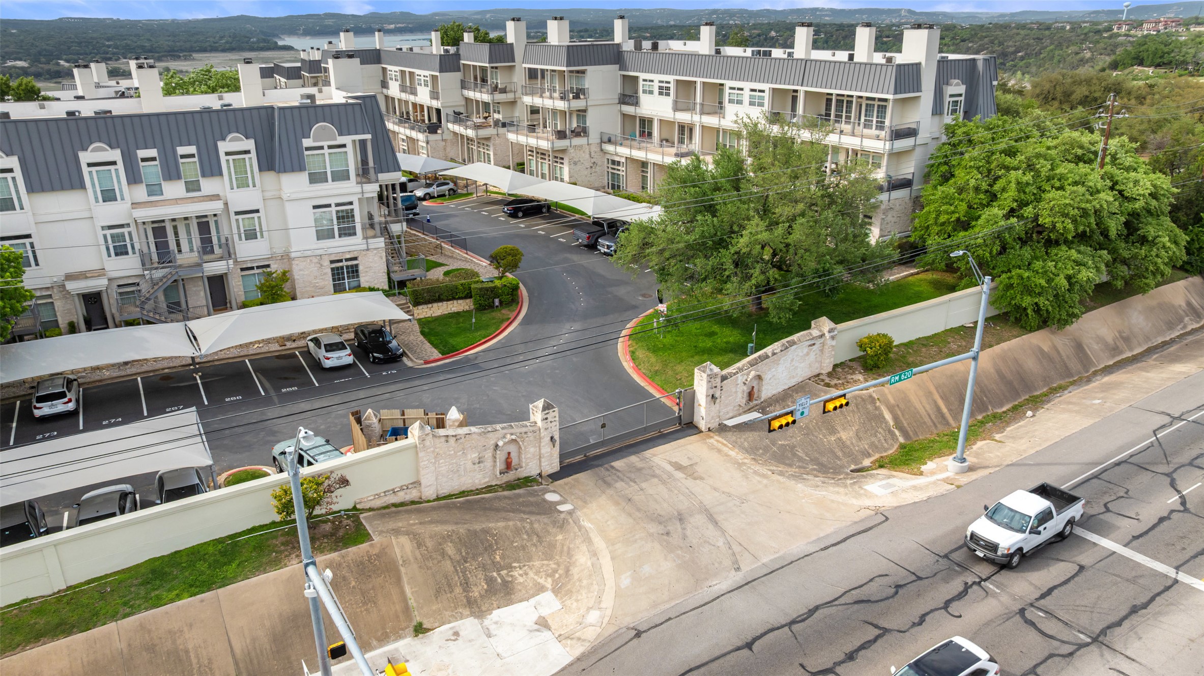 2918 Ranch To Market Road 620, Unit V267 Austin, TX 78734 - Photo 39 of 40 an aerial view of a balcony with chairs