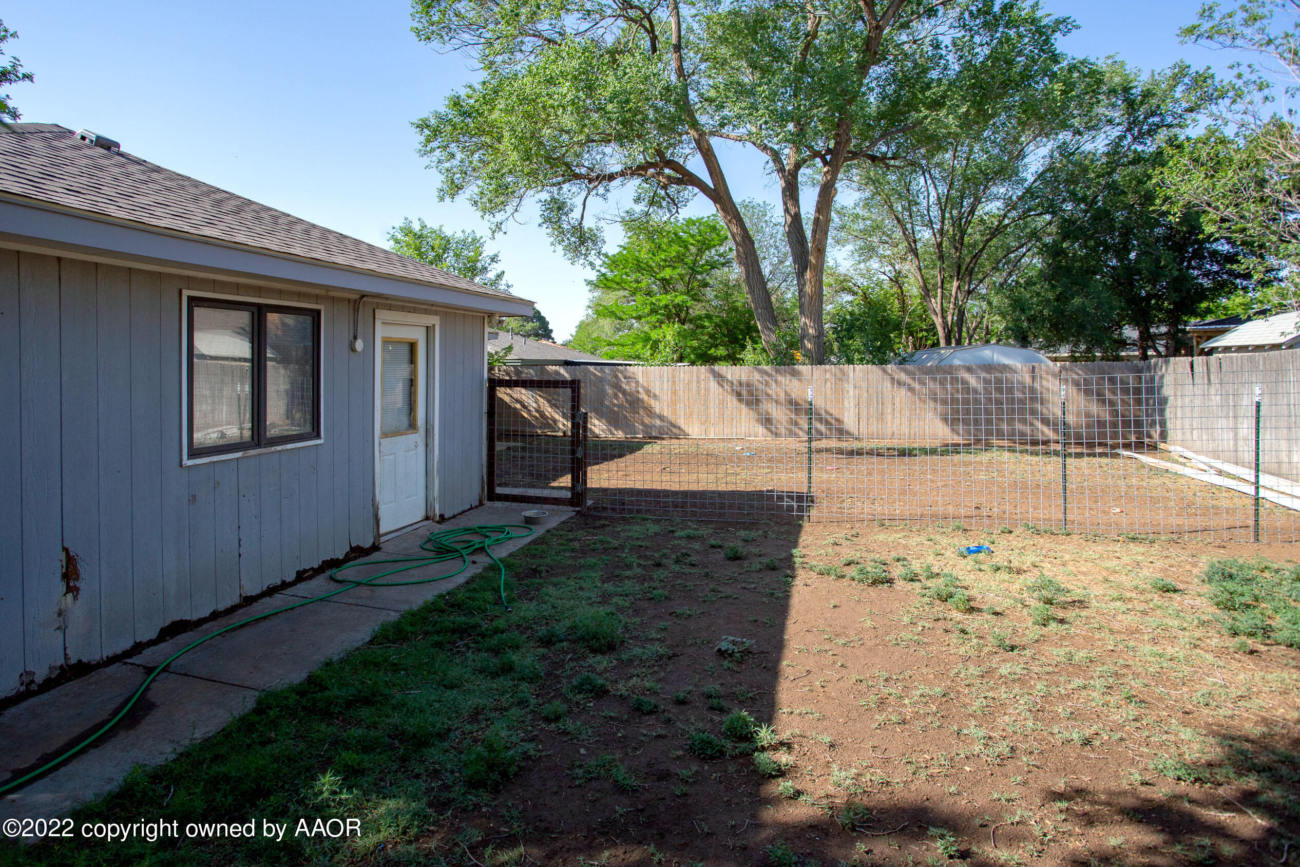 5202 Raindrop Lane Amarillo, TX 79110 - Photo 19 of 21 Backyard