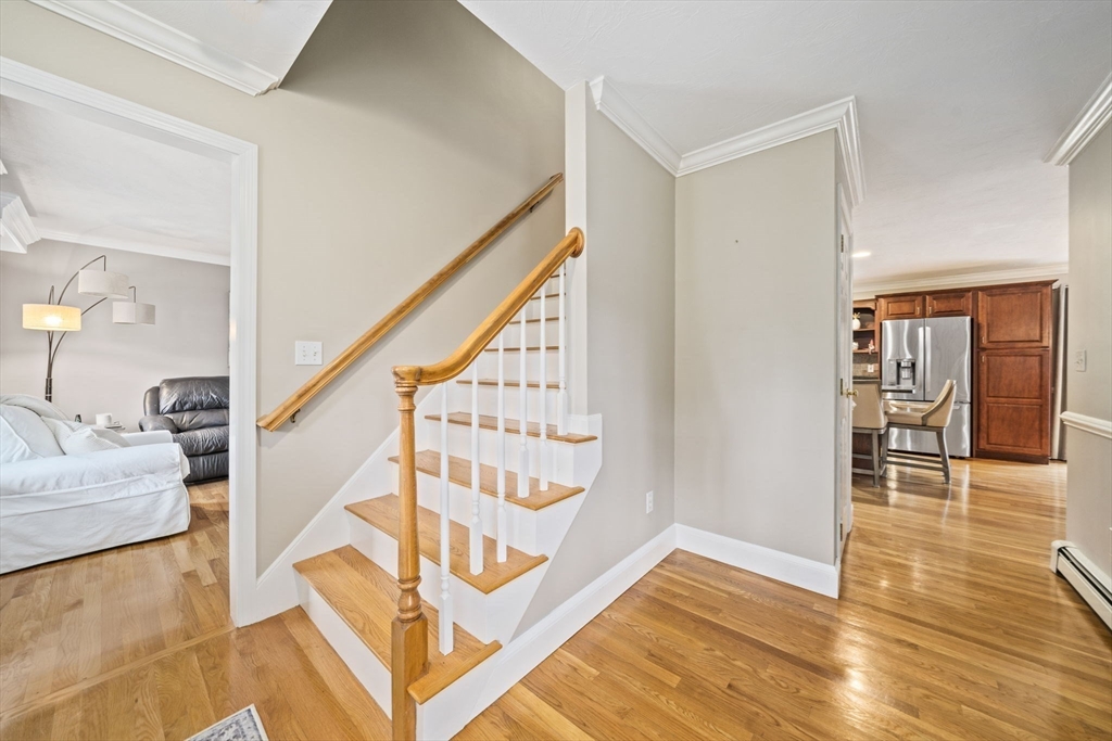 36 Meadow Lane Hanson, MA 02341 - Photo 11 of 36 a view of entryway and hall with wooden floor