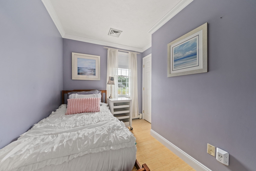 36 Meadow Lane Hanson, MA 02341 - Photo 14 of 36 a bedroom with a bed and a window