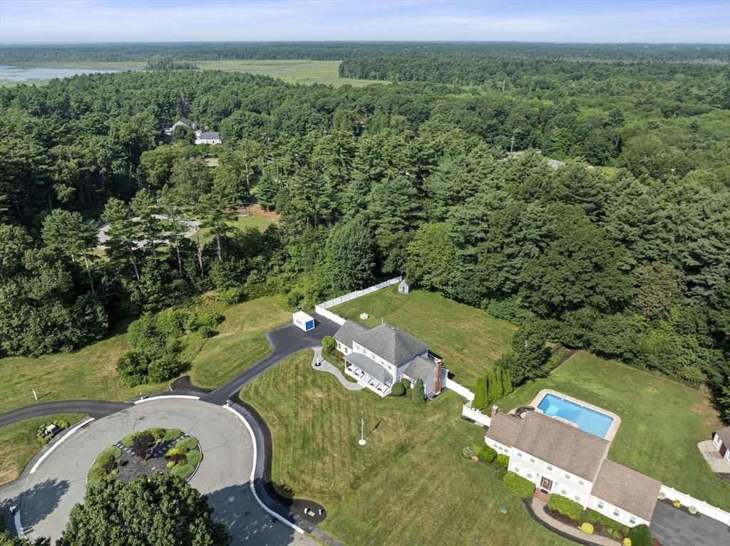 36 Meadow Lane Hanson, MA 02341 - Photo 29 of 36 an aerial view of a house with a yard