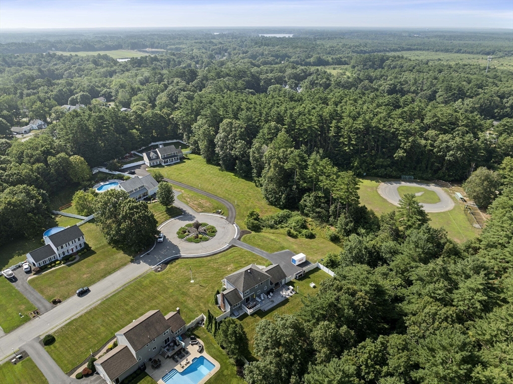 36 Meadow Lane Hanson, MA 02341 - Photo 30 of 36 an aerial view of a house with a yard