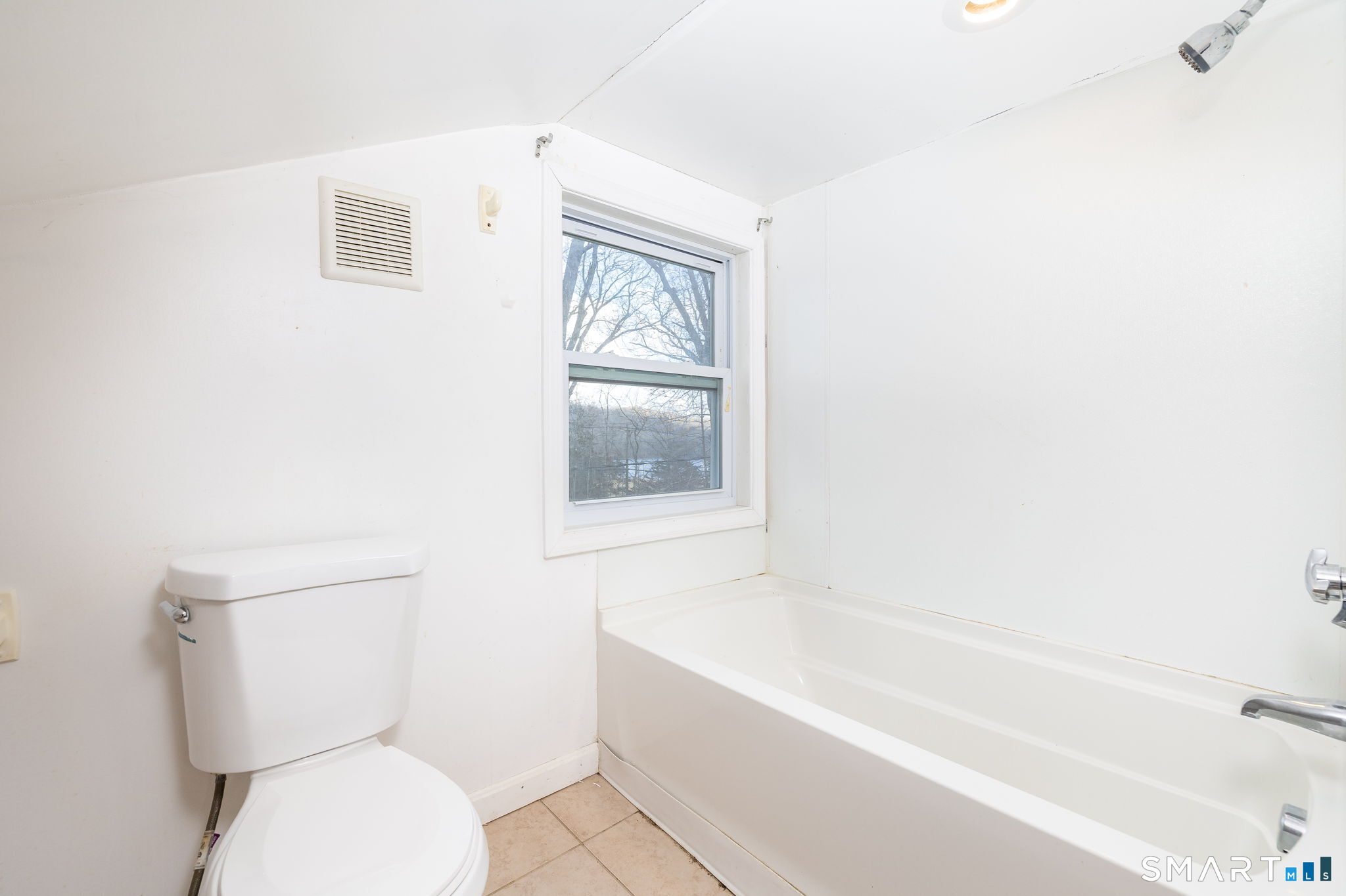 461 Pond Road Franklin, CT 06254 - Photo 27 of 35 a bathroom with a toilet a sink and bathtub