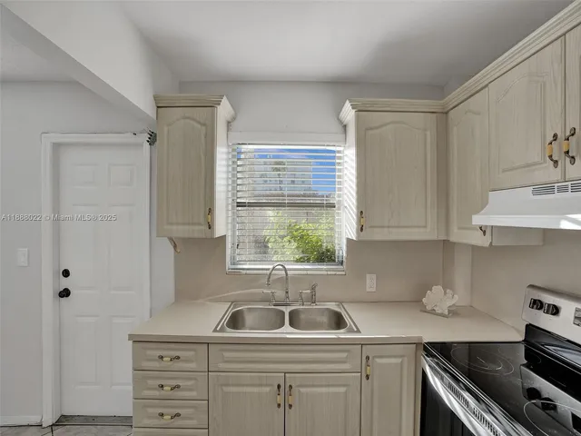 a bathroom with a sink and a bathtub