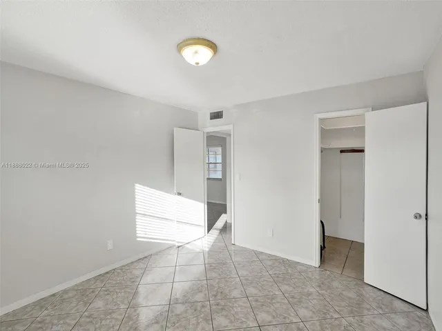 a house with a tree in front of it