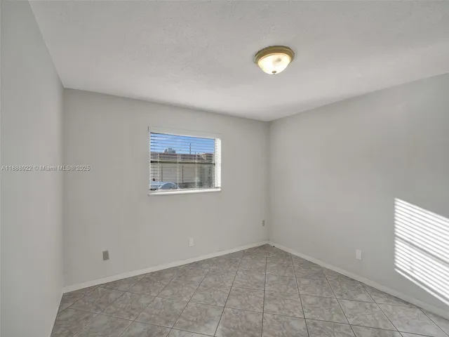 a view of a house with small yard