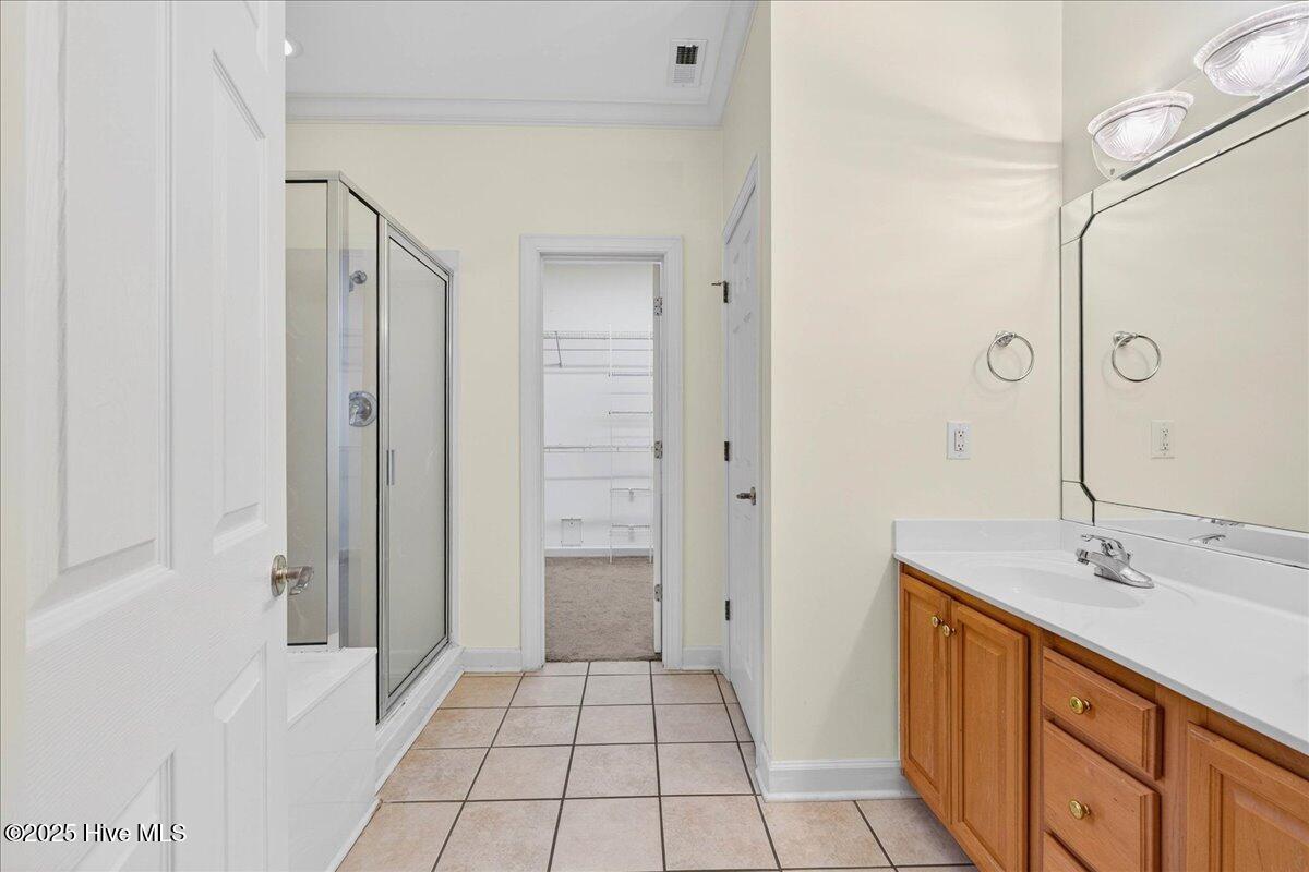 8985 Woodbine Road Southwest Sunset Beach, NC 28468 - Photo 32 of 65 Primary bathroom
