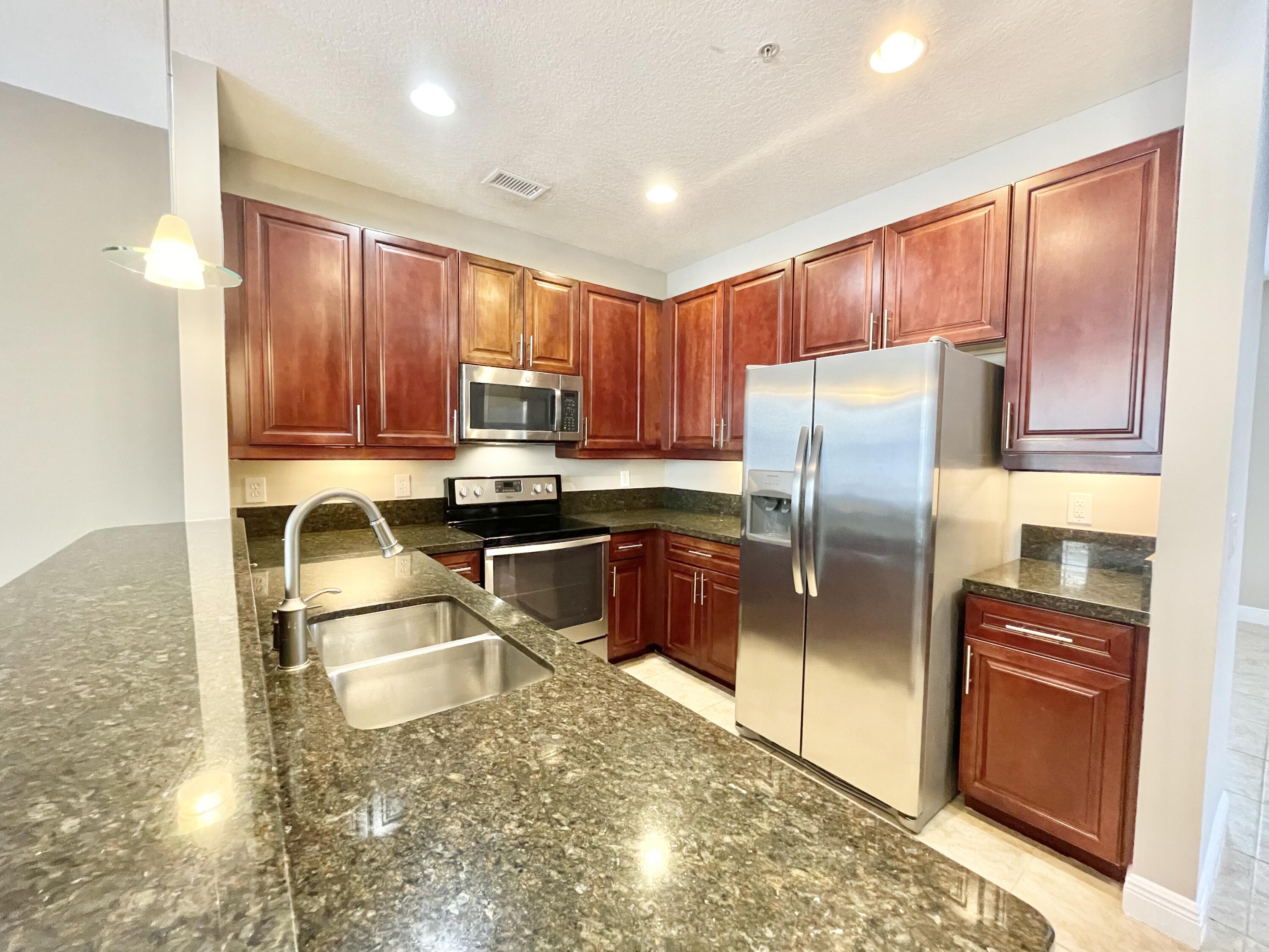 3834 Northwest 5th Terrace Boca Raton, FL 33431 - Photo 3 of 31 Open Granite Kitchen