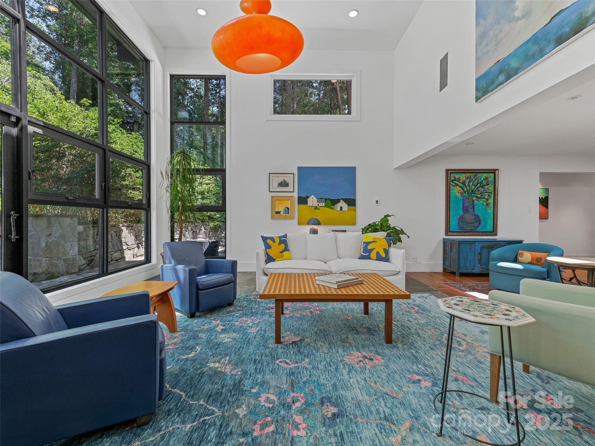 5 Brookside Road Asheville, NC 28803 - Photo 12 of 45 a outdoor living space with furniture and a large window