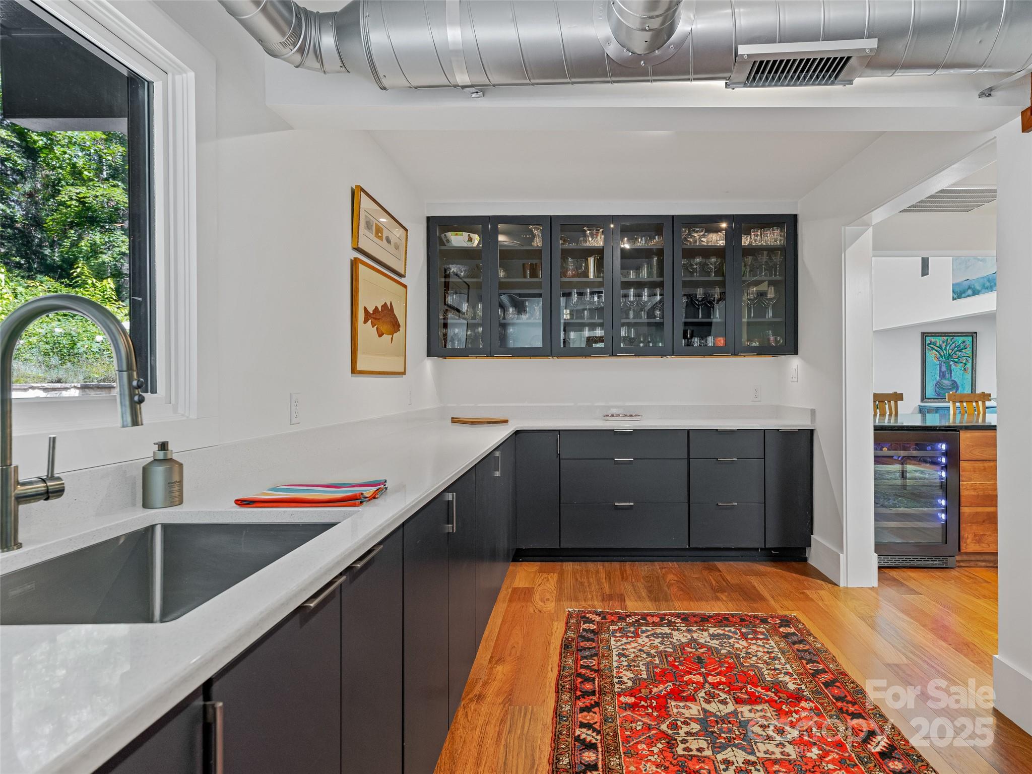5 Brookside Road Asheville, NC 28803 - Photo 27 of 45 a kitchen with stainless steel appliances granite countertop a sink stove and cabinets