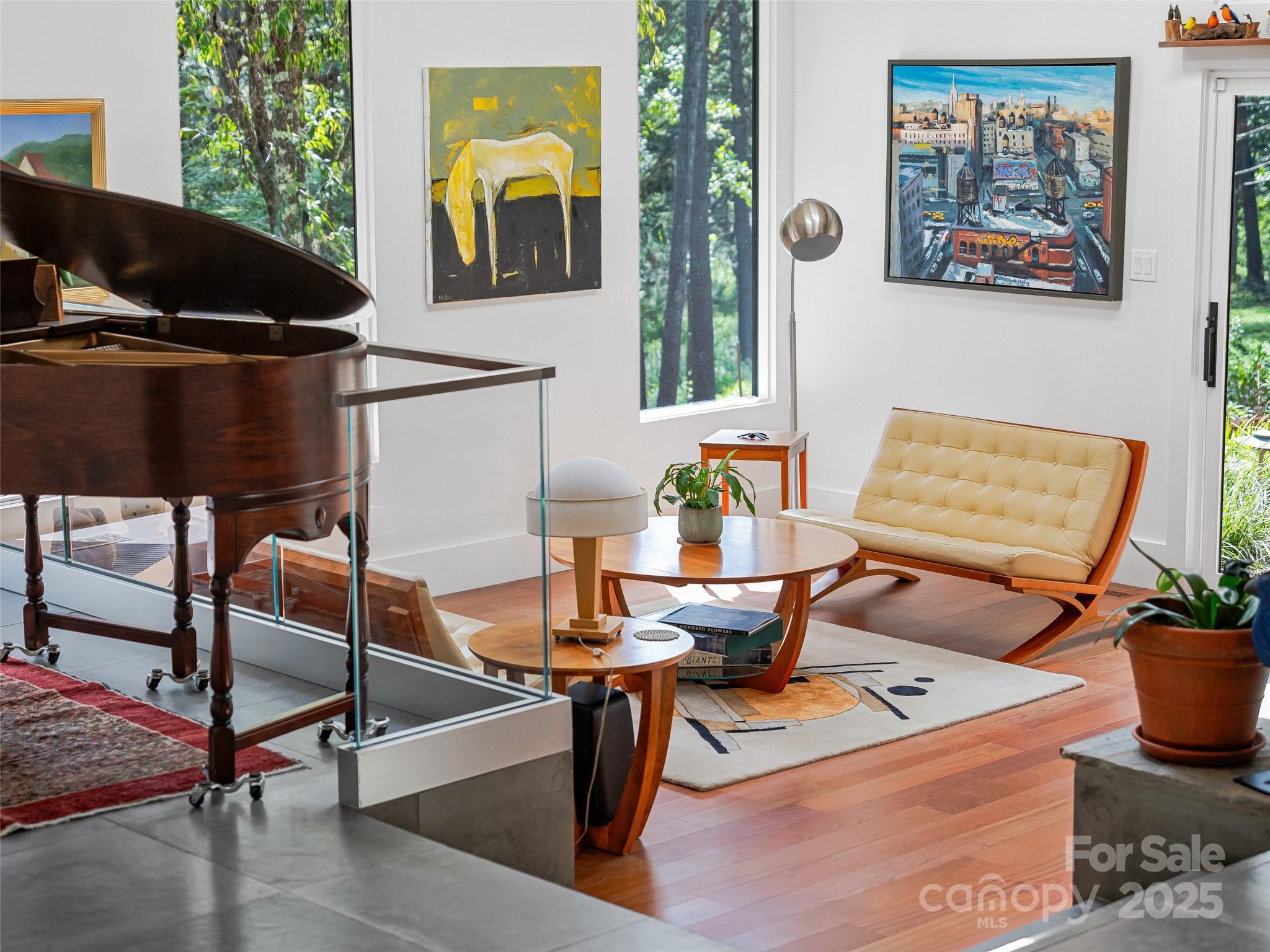 5 Brookside Road Asheville, NC 28803 - Photo 4 of 45 a dining room with furniture and wooden floor