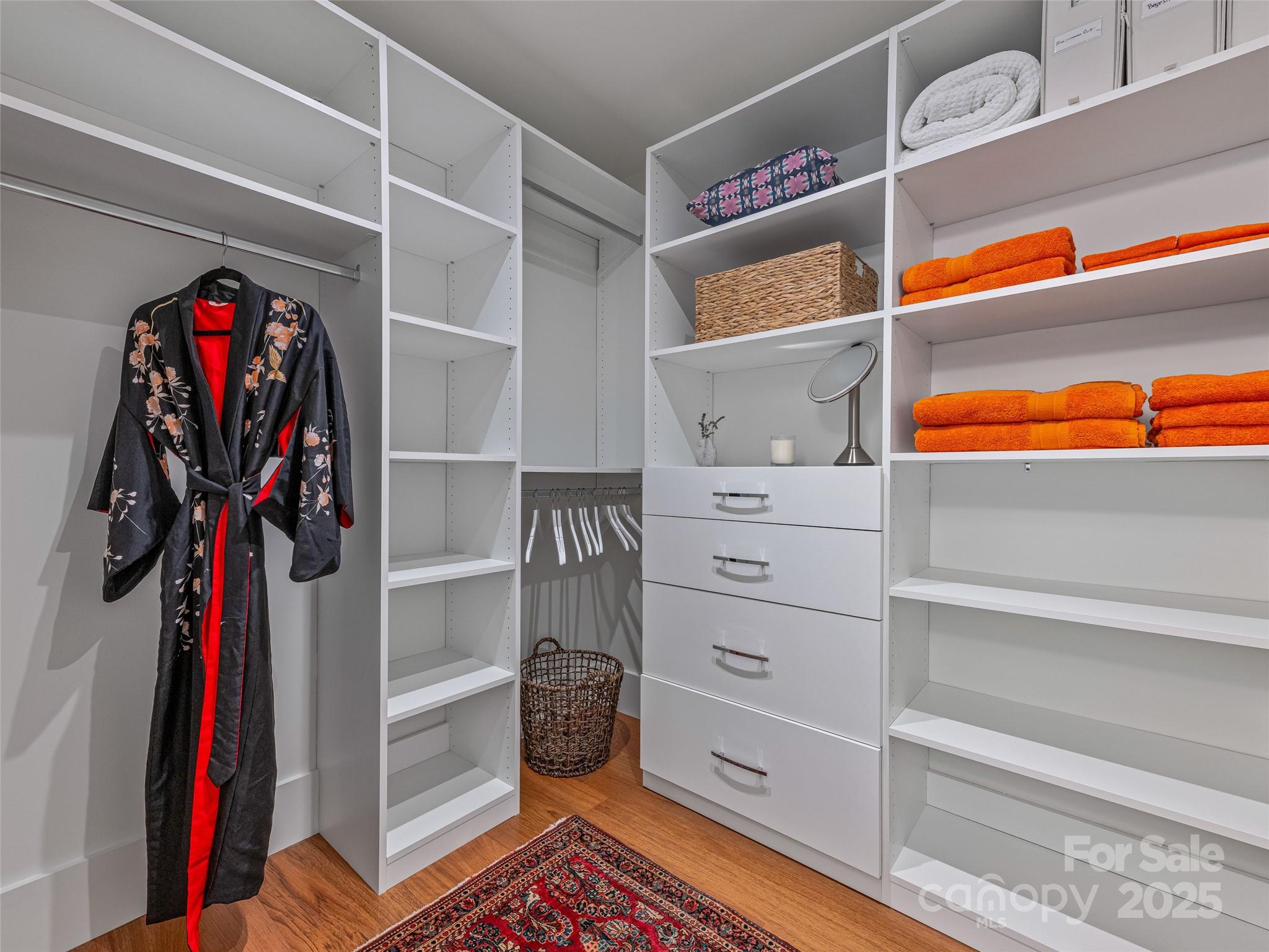 5 Brookside Road Asheville, NC 28803 - Photo 41 of 45 a view of walk in closet with clothes and shoes