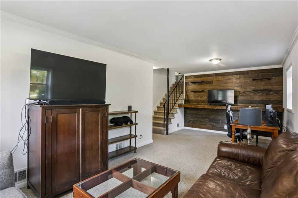 2740 Frontier Trail Atlanta, GA 30341 - Photo 26 of 29 a living room with furniture and a flat screen tv