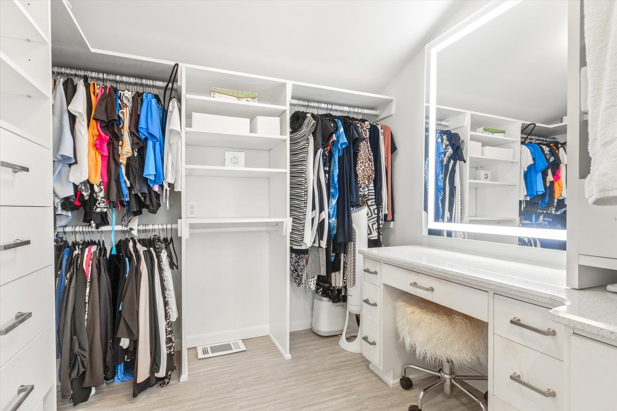 78 Ferrol Road St. Augustine, FL 32084 - Photo 23 of 59 a view of walk in closet with clothes