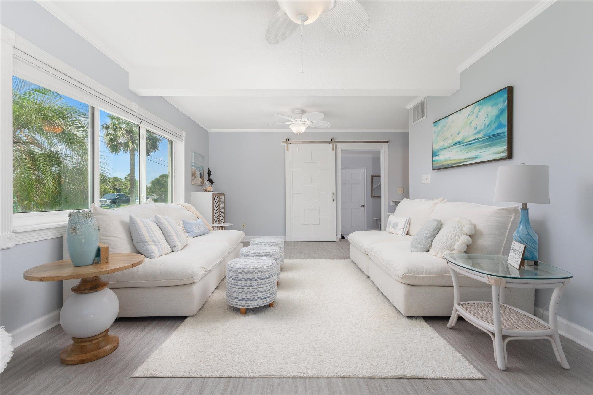 78 Ferrol Road St. Augustine, FL 32084 - Photo 25 of 59 a living room with furniture and a large window