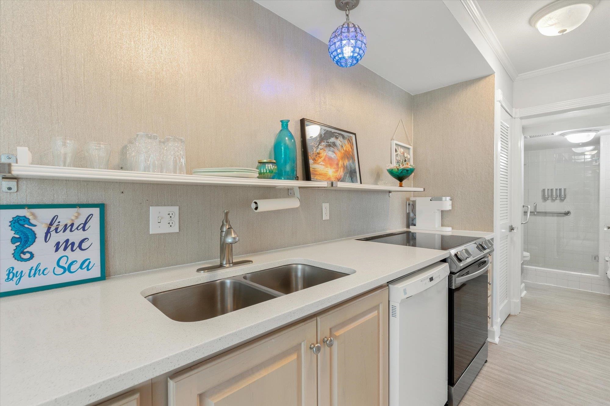 78 Ferrol Road St. Augustine, FL 32084 - Photo 29 of 59 a kitchen with a sink and a stove top oven